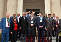 The university president inspects the faculties book fair
